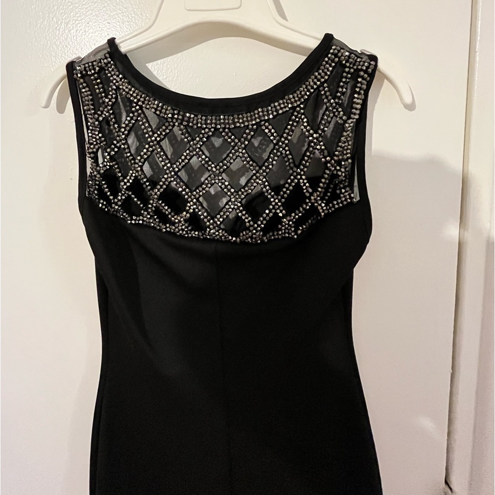 Bebe black body con dress, thrifted years ago and never wore it.